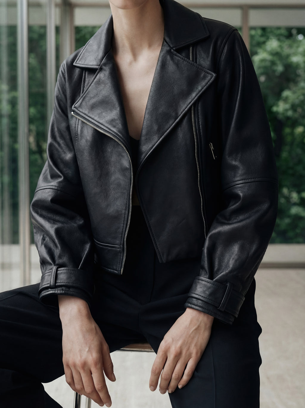 Black leather jacket with side zipper